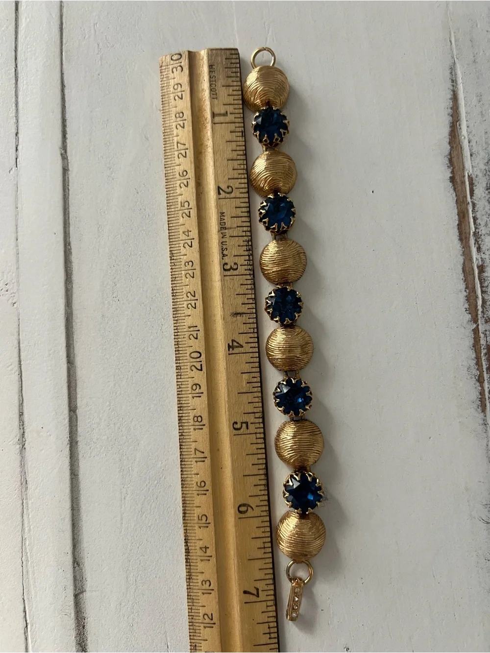 Kramer Gold-Tone Bracelet with Deep Blue Crystal Stations